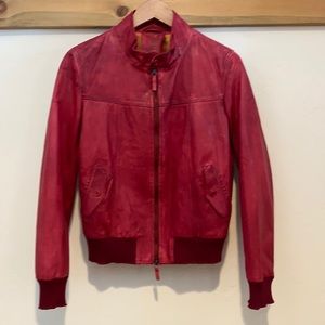 Axles of Vail women’s red leather baseball jacket. Size medium. Trim cut.